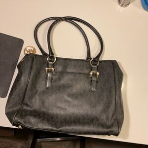 Michael Kors Monogram Signature tote/PC bag with Gold MK Charm.
